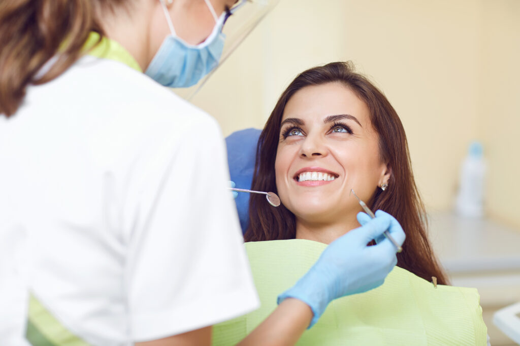 A woman and a dentist in a dental clinic
